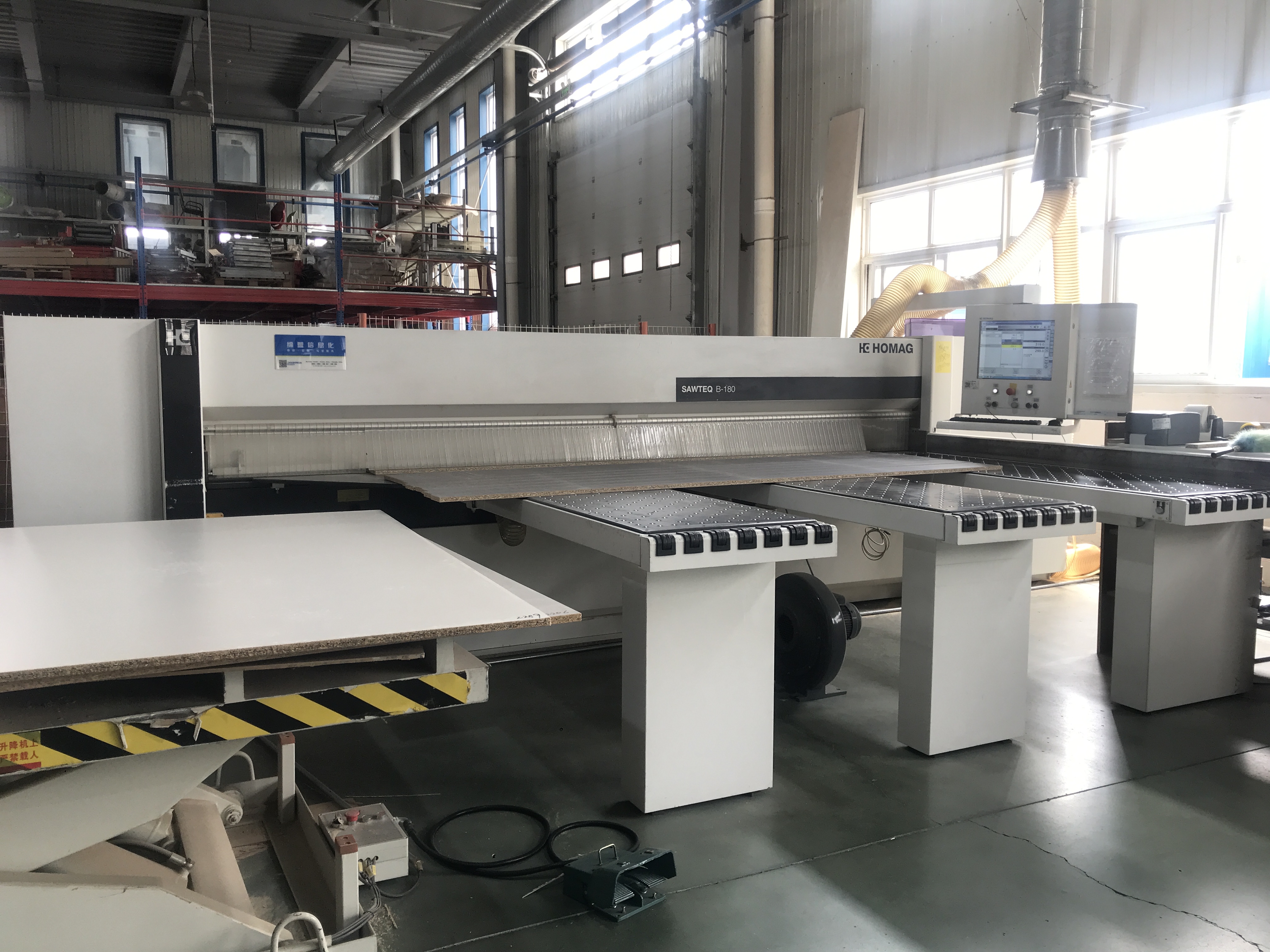 Panel cutting equipment in factory